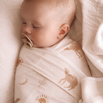 Cute Baby Boy Sleeping - Wrapped in matching swaddle & cot sheet set - Bambini Delights